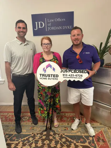 Seller who sold their property to Trusted Home Buyers, pictured at closing