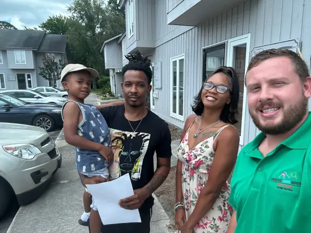 Seller who sold their property to Trusted Home Buyers, pictured at closing
