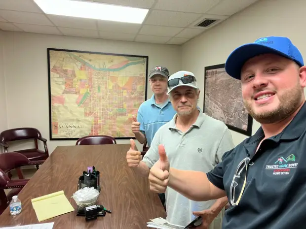 Seller who sold their property to Trusted Home Buyers, pictured at closing