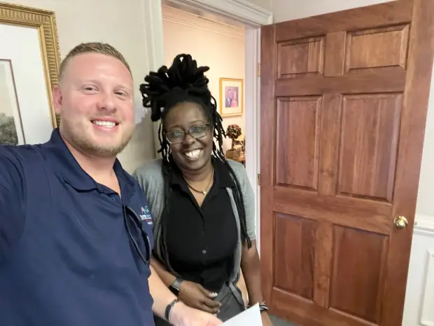 Seller who sold their property to Trusted Home Buyers, pictured at closing