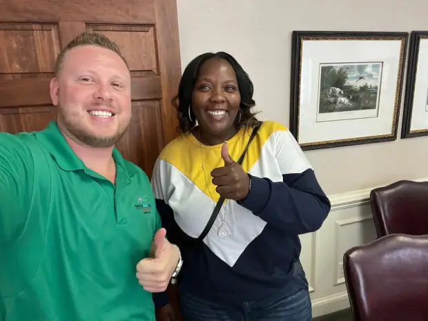Seller who sold their property to Trusted Home Buyers, pictured at closing