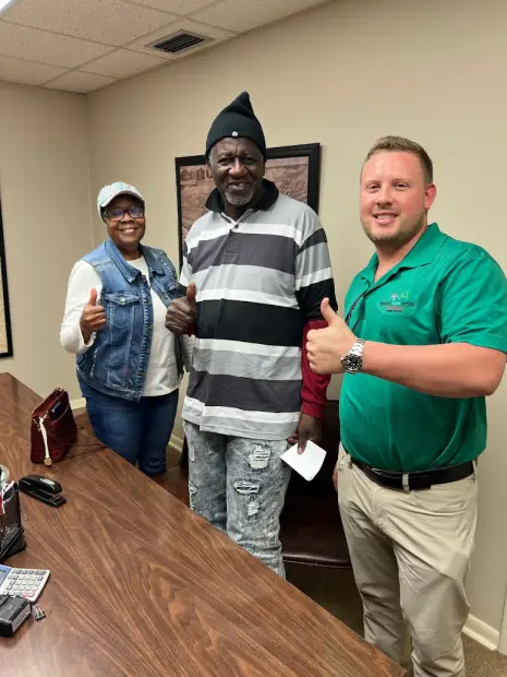 Seller who sold their property to Trusted Home Buyers, pictured at closing