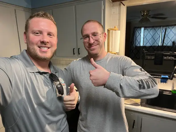 Seller who sold their property to Trusted Home Buyers, pictured at closing