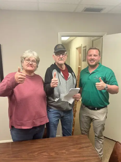 Seller who sold their property to Trusted Home Buyers, pictured at closing
