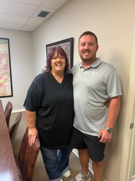 Seller who sold their property to Trusted Home Buyers, pictured at closing
