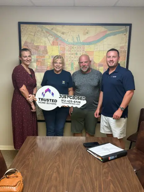 Seller who sold their property to Trusted Home Buyers, pictured at closing