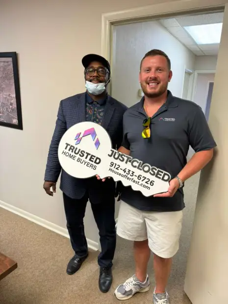 Seller who sold their property to Trusted Home Buyers, pictured at closing