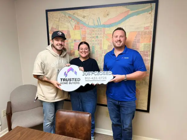 Seller who sold their property to Trusted Home Buyers, pictured at closing