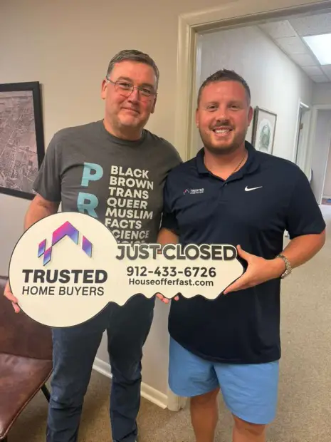 Seller who sold their property to Trusted Home Buyers, pictured at closing