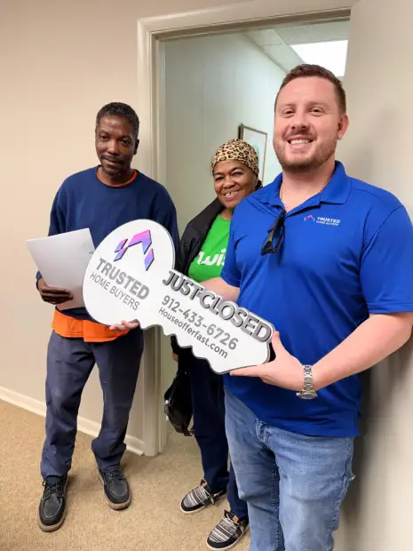 Seller who sold their property to Trusted Home Buyers, pictured at closing