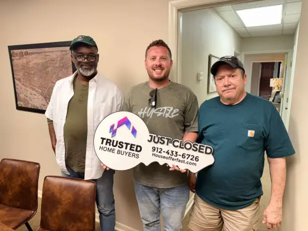 Seller who sold their property to Trusted Home Buyers, pictured at closing