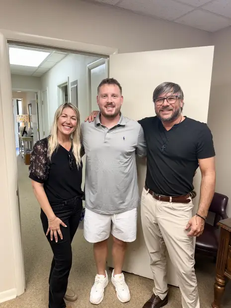 Seller who sold their property to Trusted Home Buyers, pictured at closing