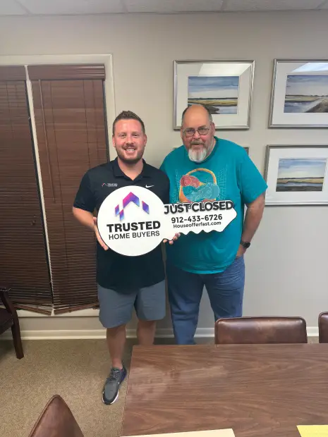 Seller who sold their property to Trusted Home Buyers, pictured at closing