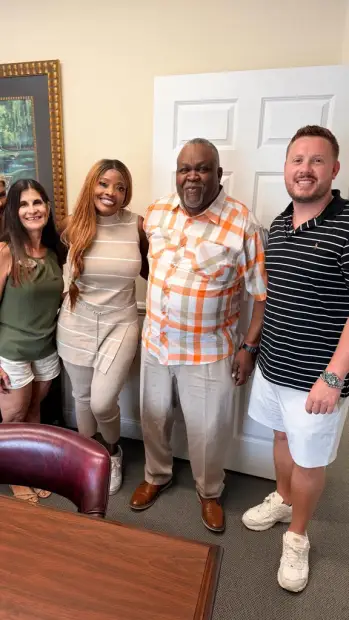 Seller who sold their property to Trusted Home Buyers, pictured at closing