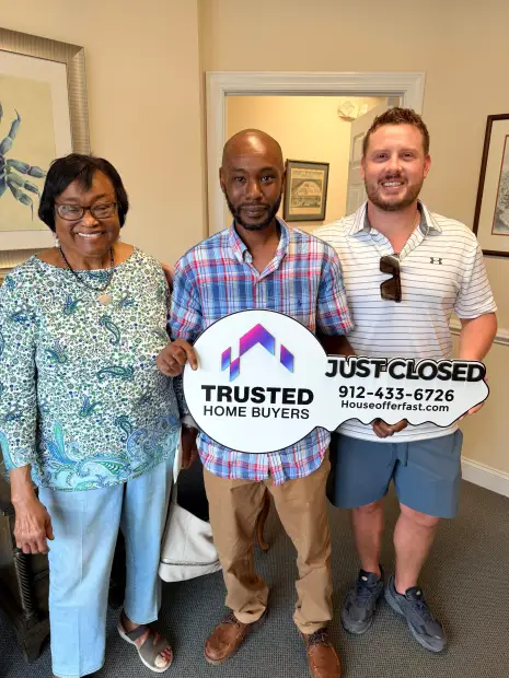 Seller who sold their property to Trusted Home Buyers, pictured at closing