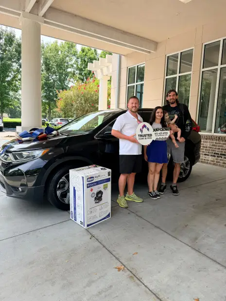 Seller who sold their property to Trusted Home Buyers, pictured at closing