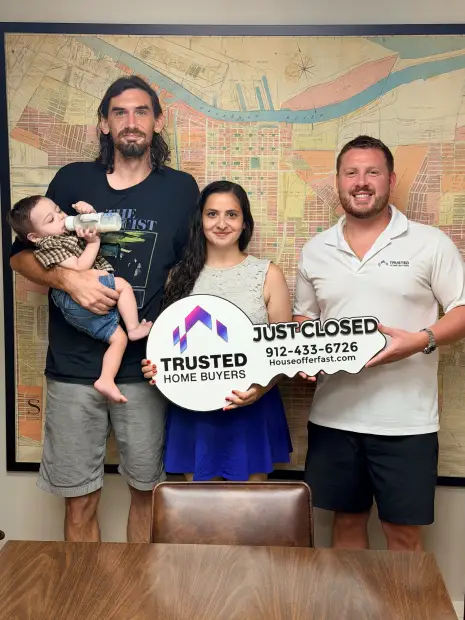 Seller who sold their property to Trusted Home Buyers, pictured at closing