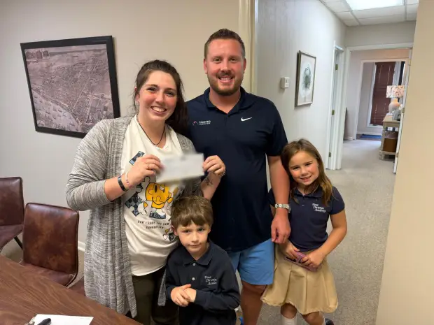Seller who sold their property to Trusted Home Buyers, pictured at closing