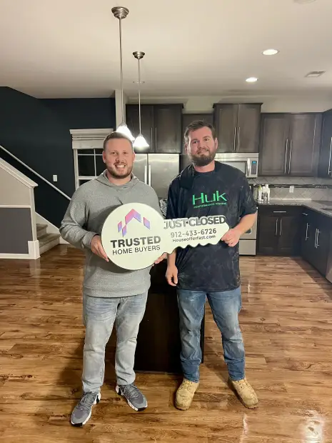 Seller who sold their property to Trusted Home Buyers, pictured at closing