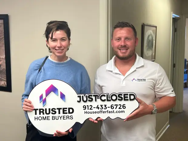 Seller who sold their property to Trusted Home Buyers, pictured at closing